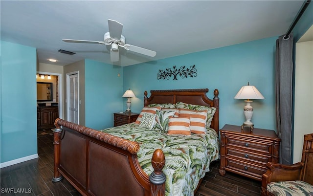 12090 Kelly Greens Blvd Unit 119, Fort Myers, FL 33908 - bedroom featuring baseboards, a closet, visible vents, wood tiled floor, and ceiling fan