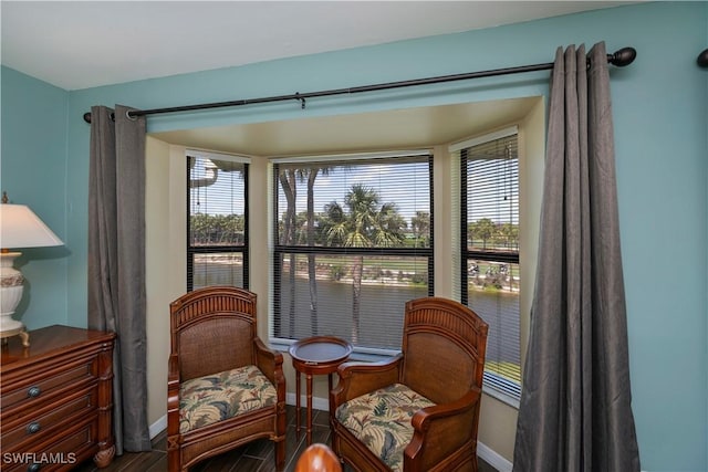 12090 Kelly Greens Blvd Unit 119, Fort Myers, FL 33908 - living area featuring baseboards and a wealth of natural light