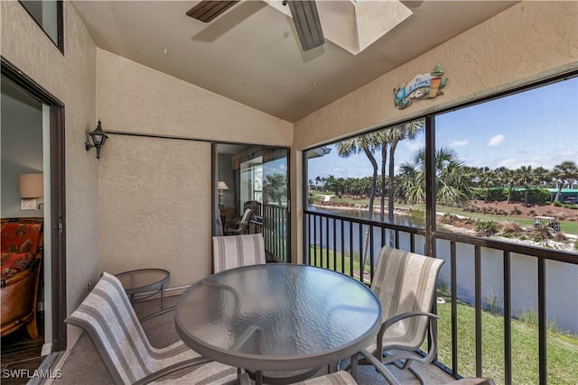 12090 Kelly Greens Blvd Unit 119, Fort Myers, FL 33908 - sunroom / solarium with outdoor dining space, a ceiling fan, and a water view