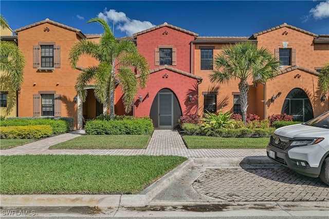 11296 Paseo Grande Blvd Unit 5806, Fort Myers, FL 33912 - mediterranean / spanish-style home featuring stucco siding and a tile roof