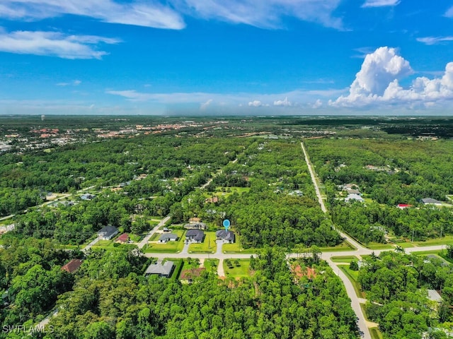 aerial view featuring a forest view