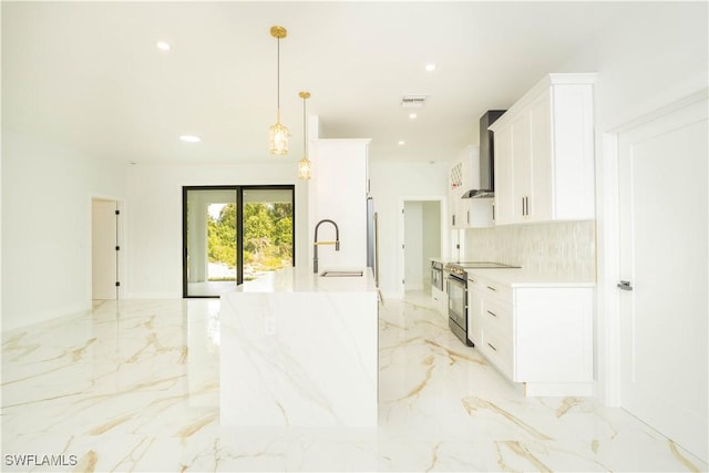 1603 E 5th St, Lehigh Acres, FL 33972 - kitchen with stainless steel range oven, wall chimney exhaust hood, light marble finish floors, white cabinets, and backsplash