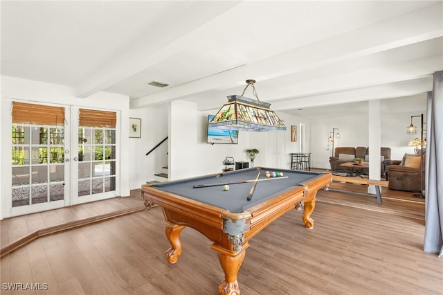 rec room with pool table, french doors, light wood-style flooring, visible vents, and beam ceiling