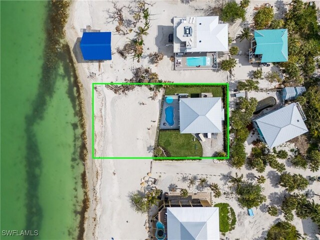 4620 Oro Pesos Ln, Upper Captiva, FL 33924 - aerial view of property's location with a pool and property parcel outlined