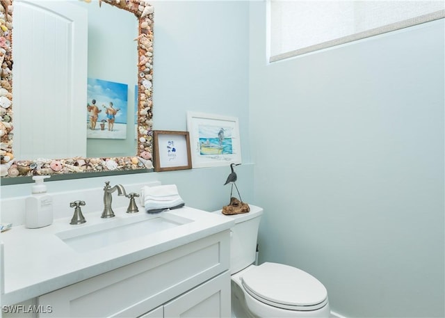 4620 Oro Pesos Ln, Upper Captiva, FL 33924 - bathroom featuring toilet and vanity