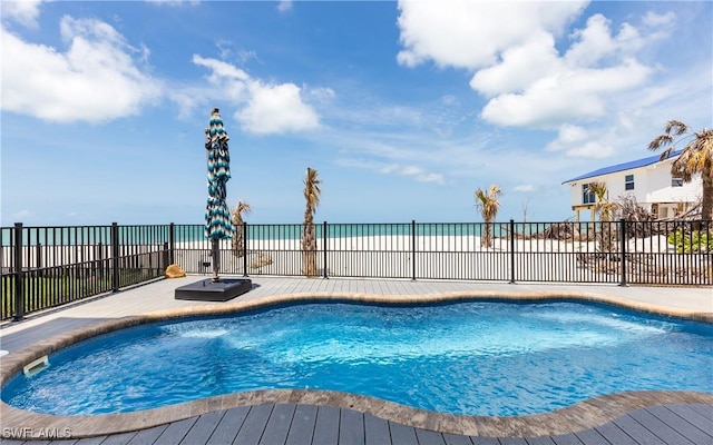 4620 Oro Pesos Ln, Upper Captiva, FL 33924 - view of swimming pool featuring view of water and beach and a patio area