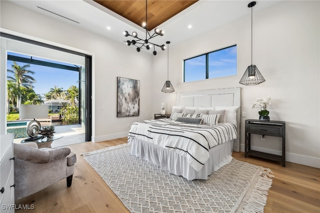 127 SW 56th Ter, Cape Coral, FL 33914 - bedroom featuring recessed lighting, light wood-style floors, access to outside, and multiple windows