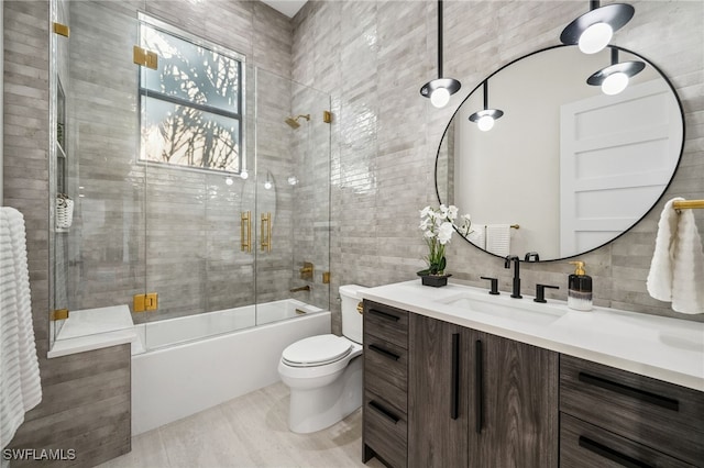 127 SW 56th Ter, Cape Coral, FL 33914 - full bath with toilet, vanity, and combined bath / shower with glass door