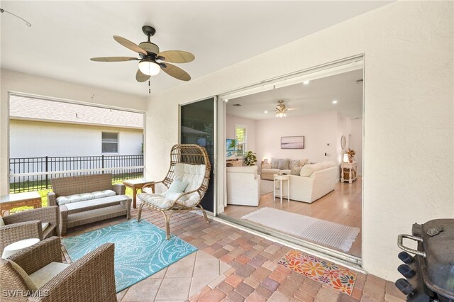 5794 Elizabeth Ann Way, Fort Myers, FL 33912 - view of patio / terrace featuring a ceiling fan, an outdoor living space, and fence