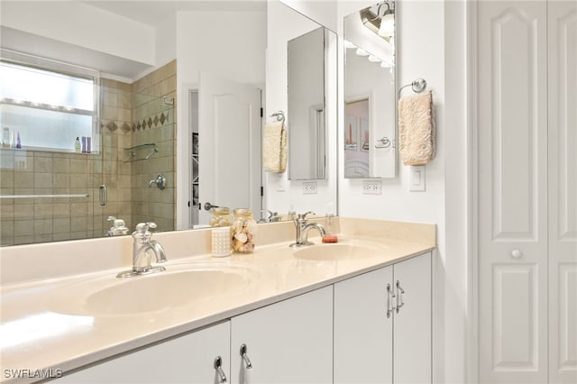 5794 Elizabeth Ann Way, Fort Myers, FL 33912 - bathroom with a shower stall, double vanity, and a sink