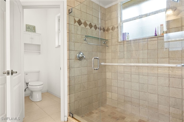5794 Elizabeth Ann Way, Fort Myers, FL 33912 - bathroom featuring tile patterned flooring, toilet, a stall shower, and baseboards
