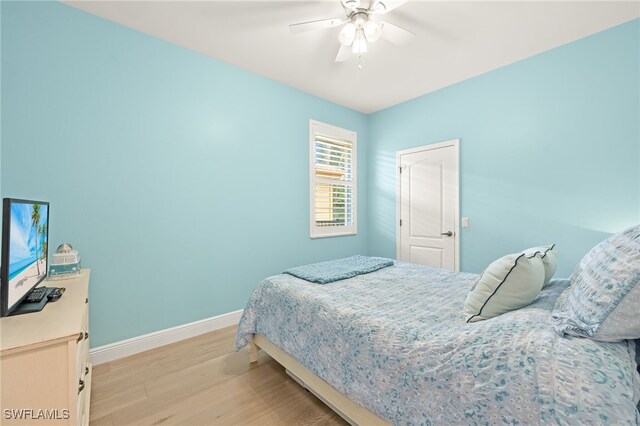 5794 Elizabeth Ann Way, Fort Myers, FL 33912 - bedroom with light wood-style flooring, ceiling fan, and baseboards