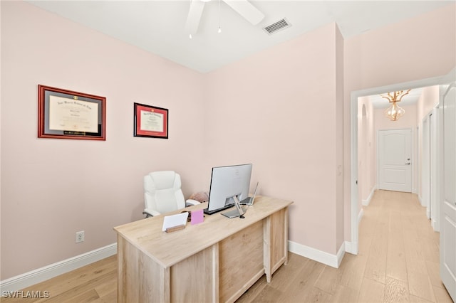 5794 Elizabeth Ann Way, Fort Myers, FL 33912 - home office featuring light wood-style flooring, ceiling fan with notable chandelier, baseboards, and visible vents