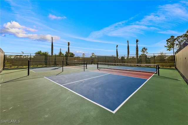view of sport court with community basketball court and fence