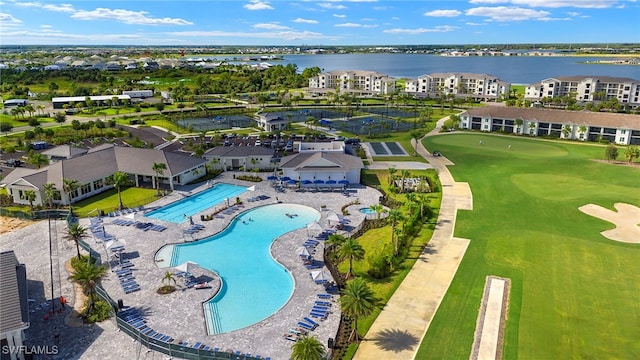 bird's eye view featuring a water view and golf course view