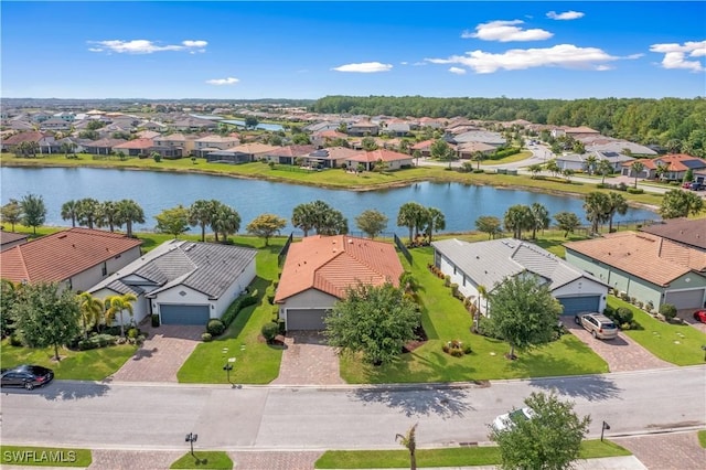 aerial view featuring a water view and a residential view