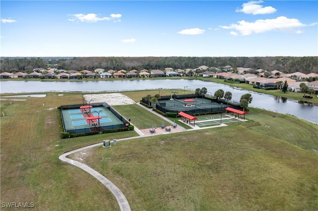 bird's eye view with a water view and a residential view