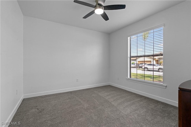 unfurnished room featuring ceiling fan, baseboards, and carpet floors