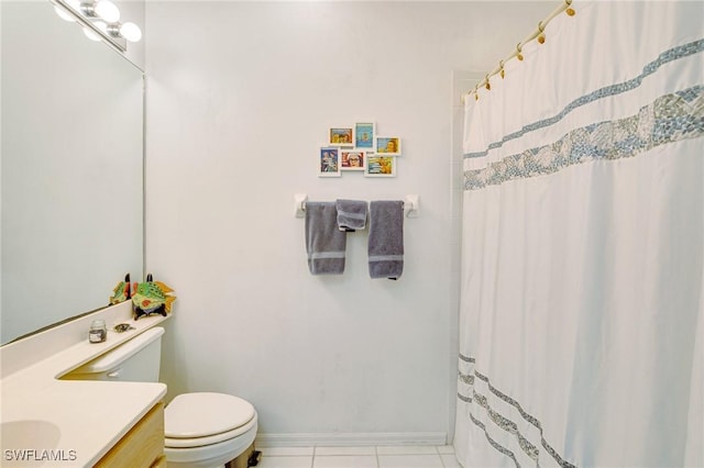 full bath featuring a shower with shower curtain, vanity, baseboards, tile patterned flooring, and toilet