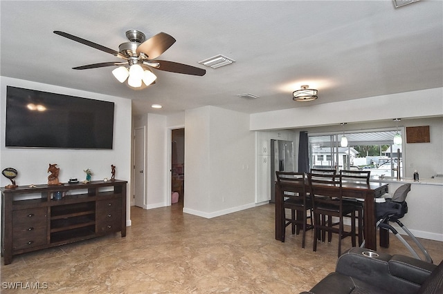 8150 Cleaves Rd, North Fort Myers, FL 33903 - dining space with visible vents, baseboards, and ceiling fan