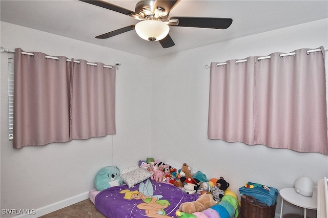8150 Cleaves Rd, North Fort Myers, FL 33903 - unfurnished bedroom featuring baseboards and ceiling fan