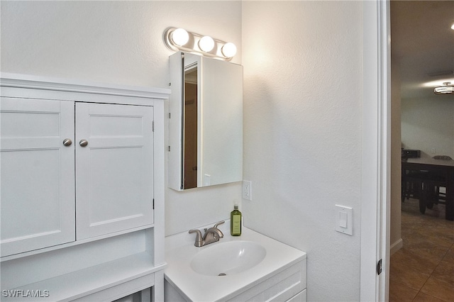 8150 Cleaves Rd, North Fort Myers, FL 33903 - bathroom featuring tile patterned flooring and vanity