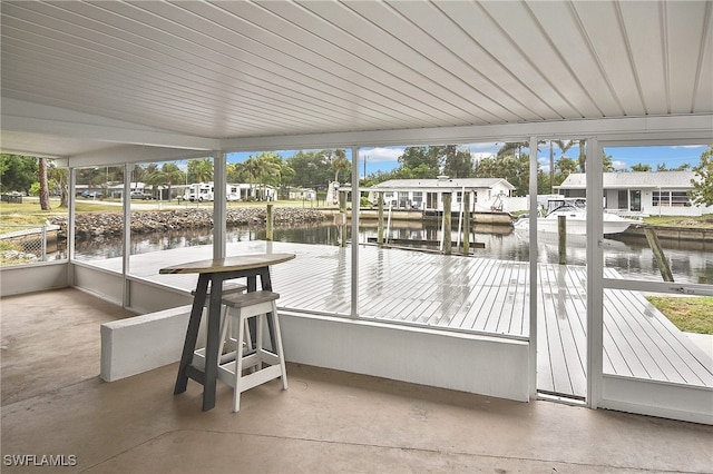 8150 Cleaves Rd, North Fort Myers, FL 33903 - view of patio / terrace with a residential view, a boat dock, and a water view