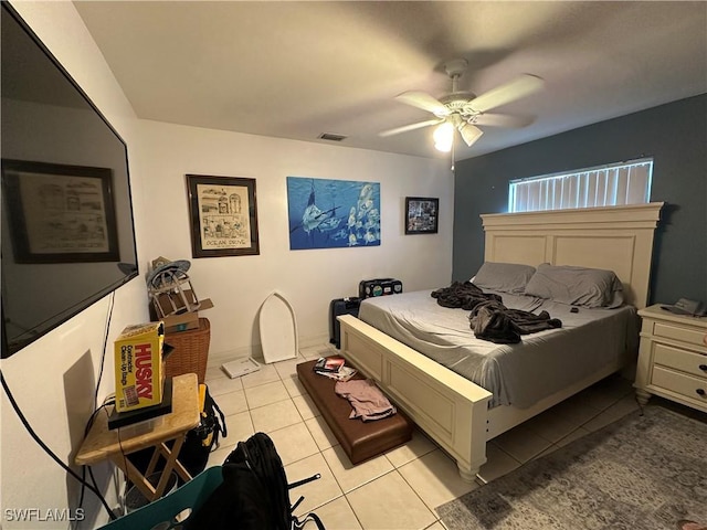 bedroom featuring visible vents, ceiling fan, and light tile patterned flooring