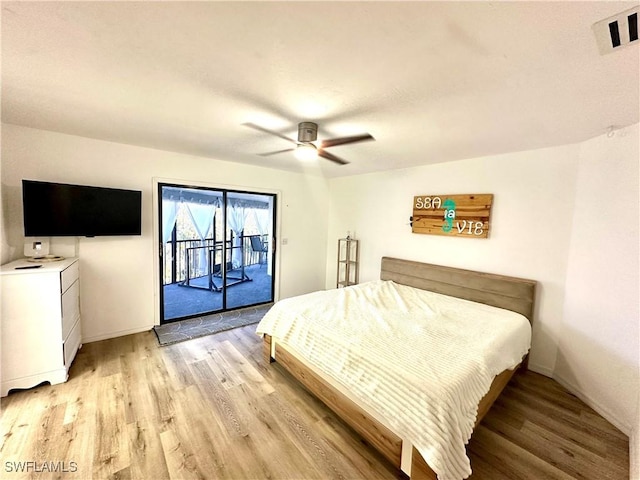 bedroom featuring light wood-style flooring, visible vents, ceiling fan, access to exterior, and baseboards