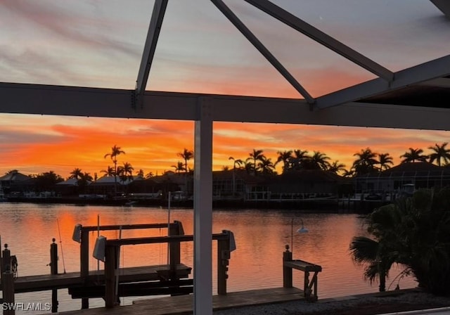 dock area featuring a water view and boat lift