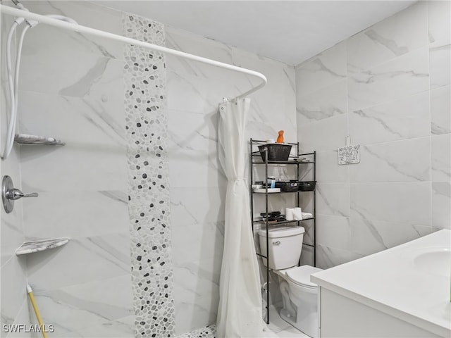 bathroom featuring a shower stall, tile walls, vanity, and toilet
