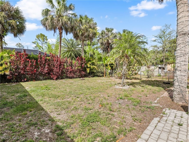 view of yard featuring fence