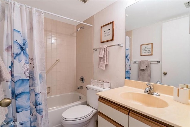 232 Pebble Beach Cir Unit E104, Naples, FL 34113 - bathroom featuring toilet, shower / bath combo, and vanity