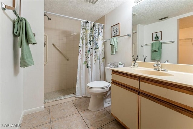 232 Pebble Beach Cir Unit E104, Naples, FL 34113 - full bath featuring vanity, toilet, a tile shower, a textured ceiling, and tile patterned flooring
