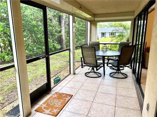 232 Pebble Beach Cir Unit E104, Naples, FL 34113 - view of sunroom / solarium