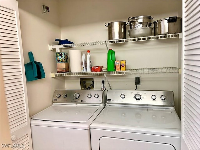 232 Pebble Beach Cir Unit E104, Naples, FL 34113 - laundry room with washing machine and dryer