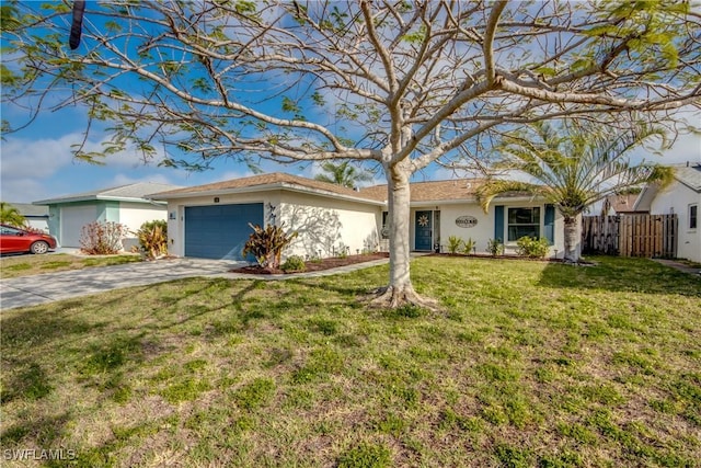 ranch-style home featuring concrete driveway, stucco siding, an attached garage, a front yard, and fence