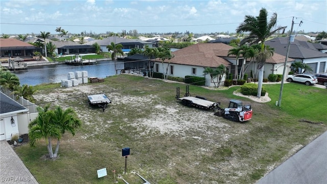 3309 NW 3rd Ter, Cape Coral, FL 33993 - aerial perspective of suburban area featuring a nearby body of water