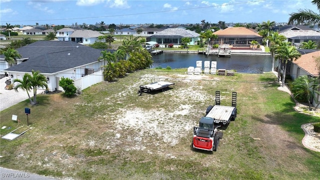 3309 NW 3rd Ter, Cape Coral, FL 33993 - aerial perspective of suburban area with a large body of water