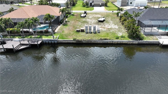 3309 NW 3rd Ter, Cape Coral, FL 33993 - aerial perspective of suburban area featuring a nearby body of water