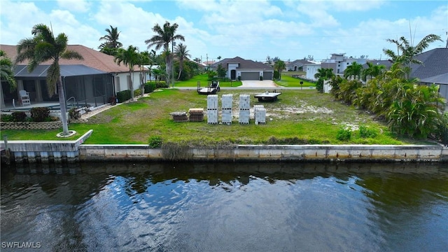 3309 NW 3rd Ter, Cape Coral, FL 33993 - back of house with a residential view and a water view