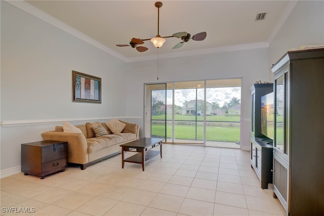 2042 Mandarin Ln, Naples, FL 34120 - living area featuring a ceiling fan, crown molding, and light tile patterned flooring