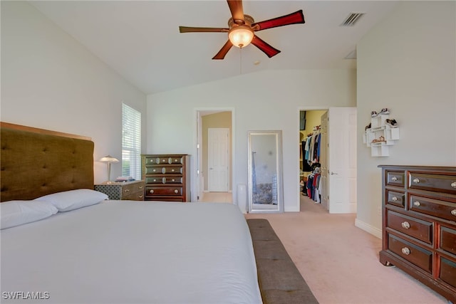 2042 Mandarin Ln, Naples, FL 34120 - carpeted bedroom featuring a spacious closet, baseboards, lofted ceiling, a ceiling fan, and a closet