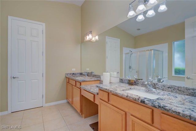 2042 Mandarin Ln, Naples, FL 34120 - bathroom with a chandelier, a shower stall, tile patterned floors, vanity, and baseboards
