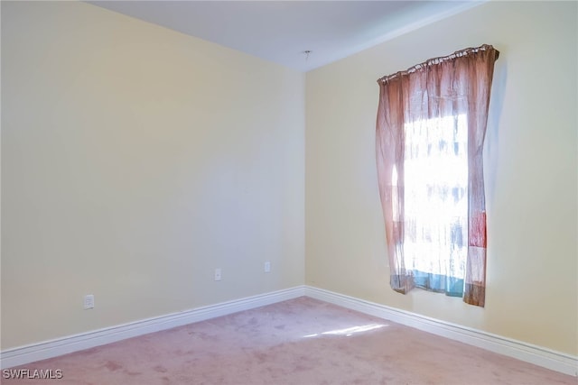 2042 Mandarin Ln, Naples, FL 34120 - carpeted spare room featuring baseboards