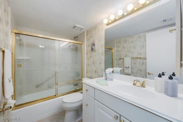 bathroom featuring visible vents, tile patterned flooring, vanity, toilet, and wallpapered walls