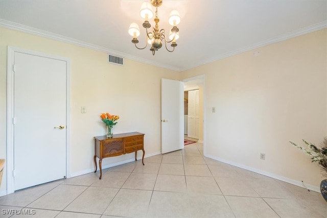 interior space with crown molding, a chandelier, baseboards, light tile patterned floors, and visible vents