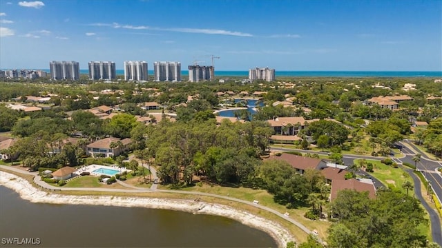 drone / aerial view with a water view and a view of city