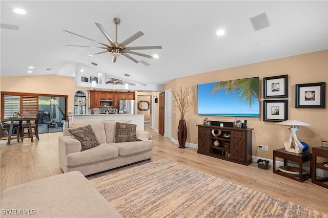 living room with light wood-type flooring, ceiling fan, lofted ceiling, and recessed lighting