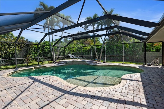 pool featuring a patio area and a lanai